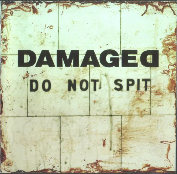 DAMAGED / DO NOT SPIT