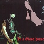 IN A GLASS HOUSE / IN A GLASS HOUSE