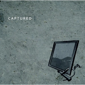 CAPTURED / CAPTURED