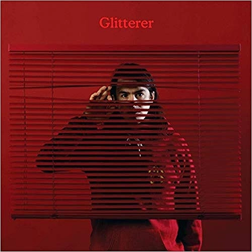 GLITTERER / LOOKING THROUGH THE SHADES