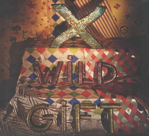 X (US) / WILD GIFT