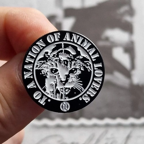 CONFLICT / コンフリクト / CONFLICT CIRCLE ENAMEL PIN (TO A NATION OF ANIMAL LOVERS)