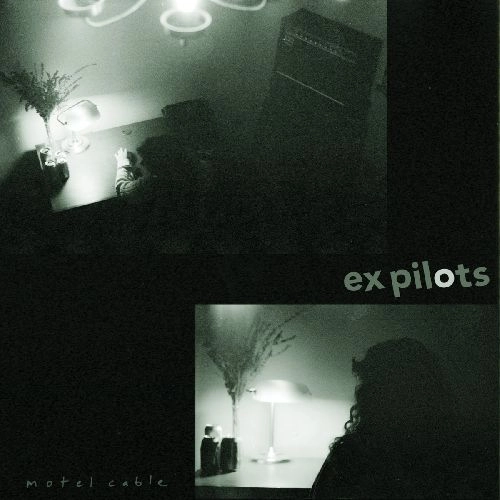 EX PILOTS / MOTEL CABLE (COKE BOTTLE W/ BLACK YOLK CENTER VINYL)