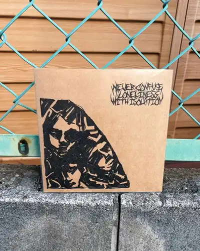 Never Confuse Loneliness With Isolation / 行き場のない悪臭 / 不整脈（7"）
